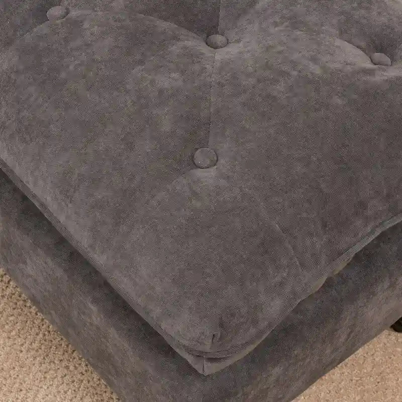 Pouf ottoman en tissu capitonné