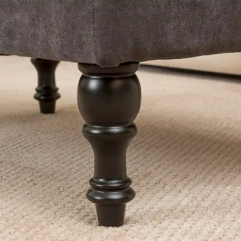 Pouf ottoman en tissu capitonné
